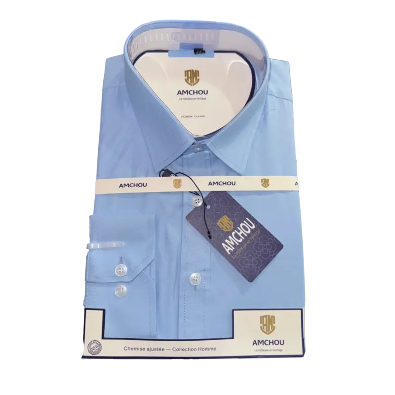 Chemise élégante pour homme à Dakar, manches longues et coupe moderne, idéale pour le bureau ou les sorties, collection AMCHOU.